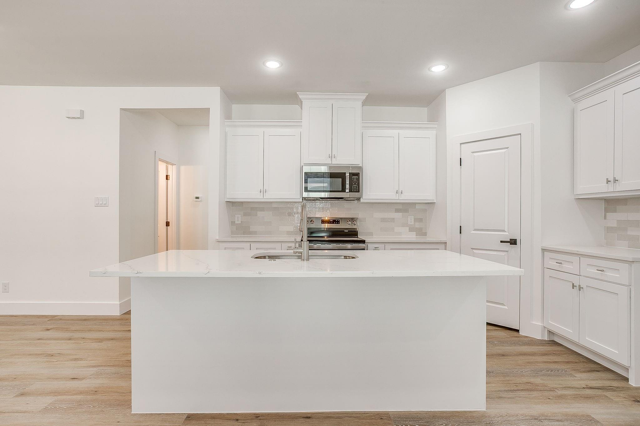 Dunbar Residence — kitchen island with quartz countertop