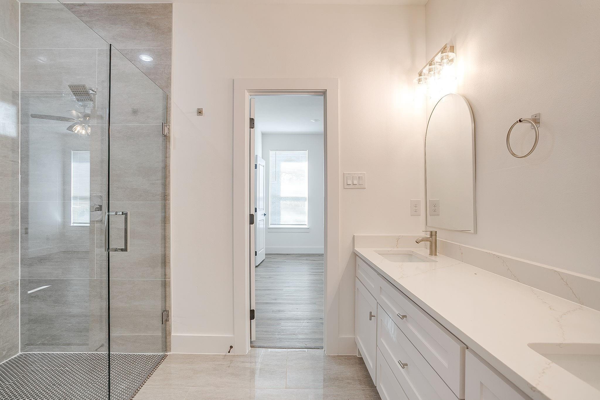 Dunbar Residence — primary bedroom with en-suite access