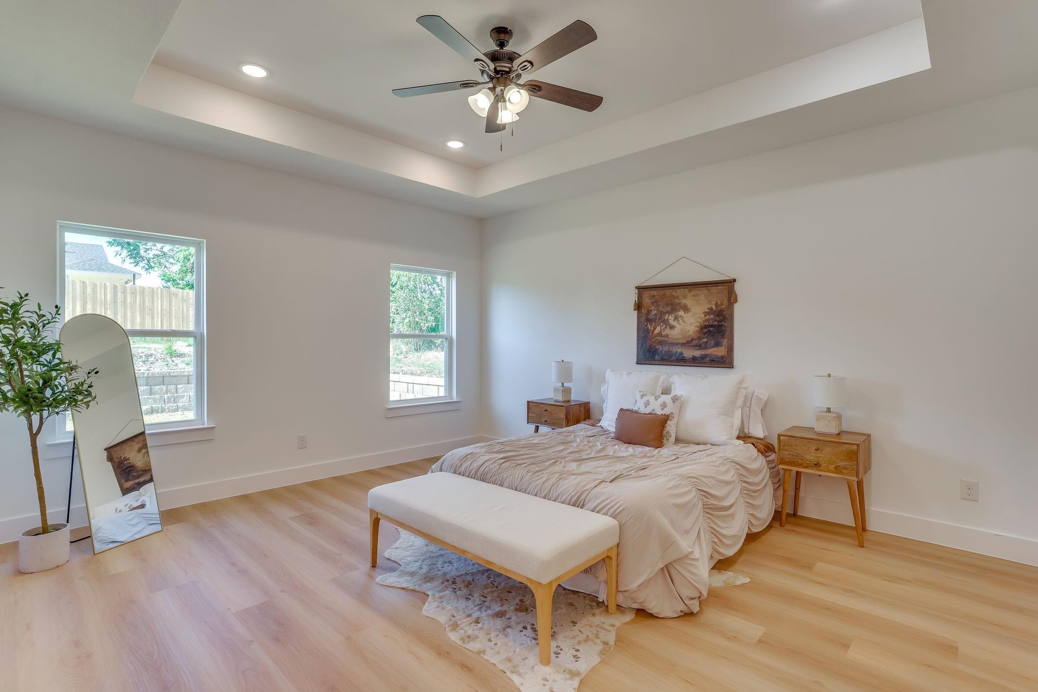 Humbert Residence — primary bedroom with tray ceiling